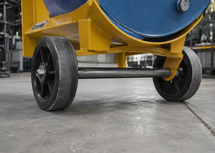 Rodas de carrinho para tambor recebendo apoio desigual sobre piso com pequeno desnível